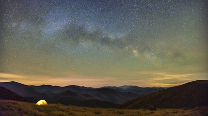 tent. A glowing tent beneath the Milky Way in a serene mountain landscape, capturing tranquil camping under natural light. travel magazines.