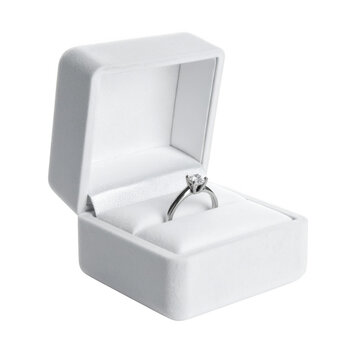 Engagement ring in open box isolated on white background.