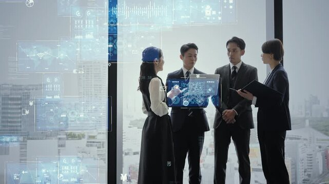 会議するビジネスパーソンのグループとデジタルテクノロジーのコンセプト