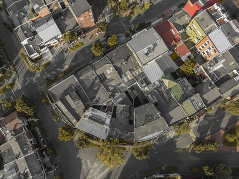 Aerial view of urban neighborhood with diverse building architecture and street layout. Bogota DC, Colombia