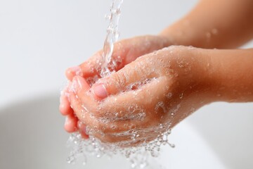 Fototapeta premium Washing hands with water hygiene and health care concept