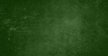Abstract green background. Distressed textured green backdrop with scratches, splashes, gradient with space for text. Blank background wallpaper for design, advertising, and mockups. Green chalkboard