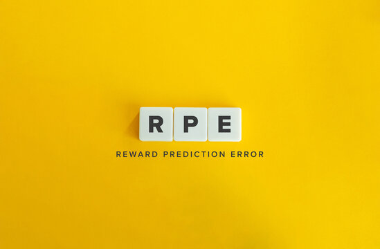 RPE Reward Prediction Error Psychology Concept Text on Yellow Background