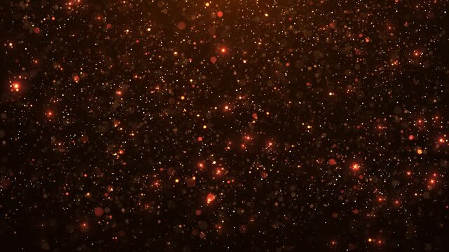 Golden glowing particles floating in dark space, sparkling bokeh dust with warm light, elegant abstract background for luxury, celebration and magic visuals. Seamless loop