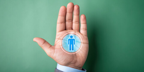 Hand with blue human icon in palm symbolizing personal identity and connection, conveying trust and security in green background