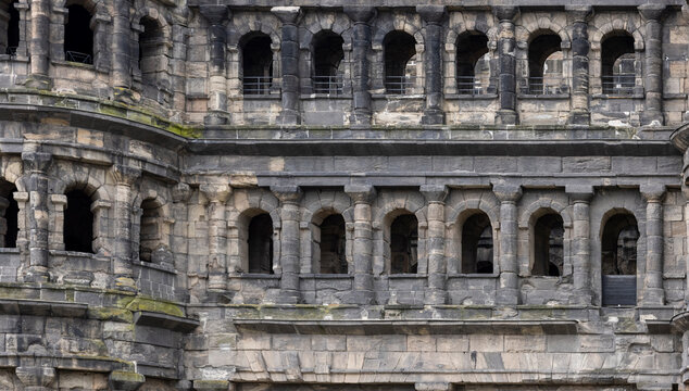 a stone building with large arched windows that burned down in a fire
- Powered by Adobe