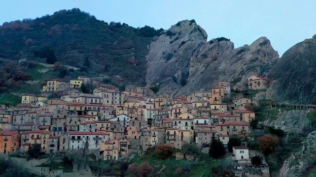 Aerial view of the old village of Castelmezzano nestled at the foot of Dolomiti Lucane mountains, with its unique architecture, Castelmezzano, Basilicata, Italy.