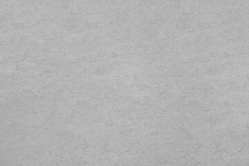 Fototapeta premium Cloud dancer 11 4201 tcx white stone stucco in plaster wall texture background for interior or exterior design concept grey gray beige colour of the year 2026 Trendy color