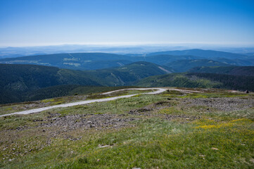 Obraz premium Sněžka Peak, Poland 02 July 2025, walk on Sněžka and view of Poland and the Czech Republic, visit to the top of the mountain.