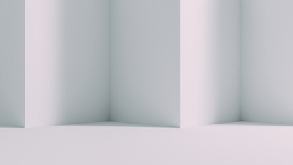 Empty corner in a room with white walls and floor in daylight