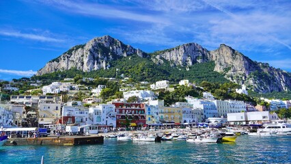 Fototapeta premium Capri Italy. A View of the ferry docks and the town of Marina Grande on the picturesque island of Capri in the Tyrrhenian Sea, Italy