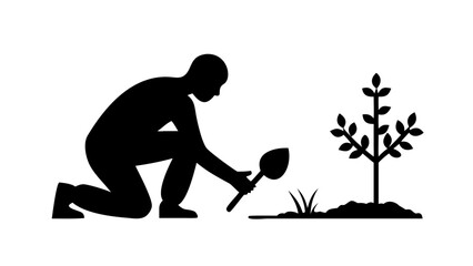 Silhouette of a person kneeling and planting a small tree, gardening hobby, environmental growth concept.