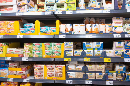 Variety of crispbread at store shelf in supermarket in Trier, Germany, bread assortment with spelt, wheat, rye and grain