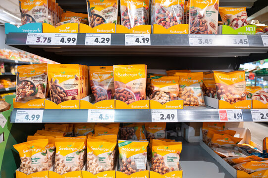 Mix of nuts and dry fruits, almonds, walnuts, hazelnuts and raisons, healthy food snack, assortment in supermarket in Trier, Germany
