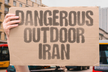 "Dangerous Outdoor Iran" Public spaces pose heightened risks. HAZARD. STREET. PERIL. IRAN. RISK.
