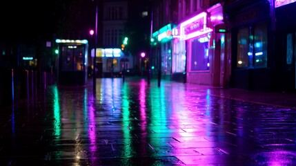 Colorful lights reflect on wet streets at night in a bustling city scene