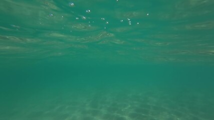 UntiUnder the shallow sea surface at Pedn Vounder Beach, South Cornwall, England on a sunny June day.tled Project