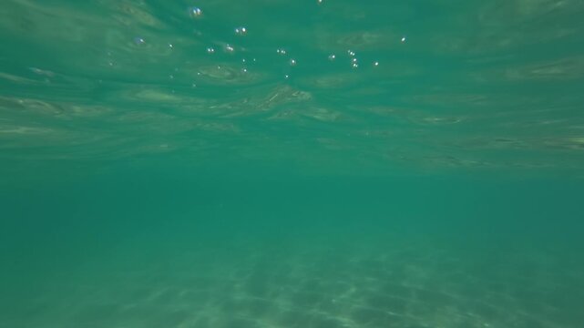 UntiUnder the shallow sea surface at Pedn Vounder Beach, South Cornwall, England on a sunny June day.tled Project