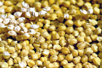 Close-up of soaked chickpeas in bowl ready for cooking. Represents affordable nutrition, plant based food planning, household food security, and smart preparation in times of rising grocery costs.