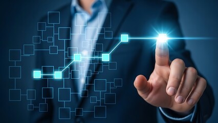 Businessman's finger touches a glowing digital interface displaying a network and growth chart