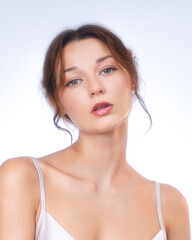 Natural Beauty Portrait of a Young Woman with Fresh Dewy Makeup