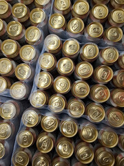 Beer cans. Aluminum beer cans in supermarket. Beer products on shop shelves