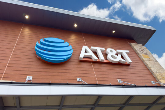 Frisco, Texas, USA - November 15th, 2025: AT&T retail store exterior displaying telecommunications brand signage