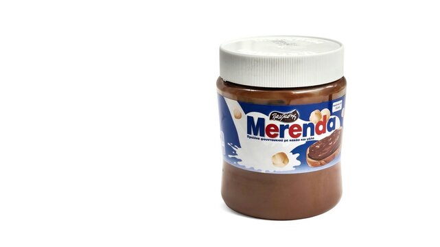 Photo of a Merenda creamy hazelnut cocoa spread jar. Merenda is a beloved Greek chocolate-hazelnut spread originally produced by the company Pavlidis.