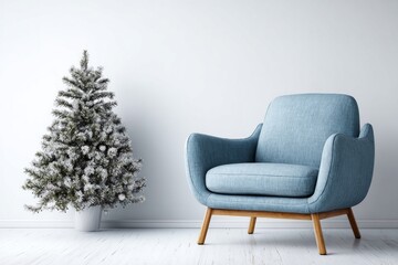 Minimalist interior setting features a light blue armchair beside a small flocked evergreen plant