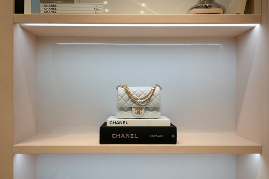 Small handbag on shelf in Chanel store at IFC mall
