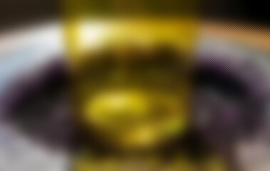 Abstract textured background with golden gradient. The surface features a subtle dimpled pattern and soft light.