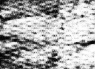 Extreme macro of black printer halftone dots forming layered cloud shapes with dark sky patches and soft tonal gradient, isolated on a transparent background