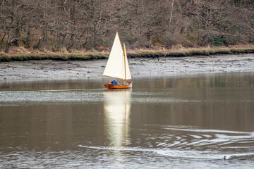 Bursledon England - March 15 2023: wooden sailing boat on The River Hamble Hampshire England