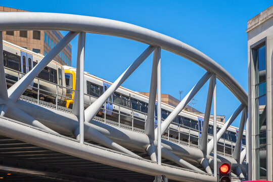 Southeastern trains leaving from London Bridge railway station, crossing a railway flyover in London