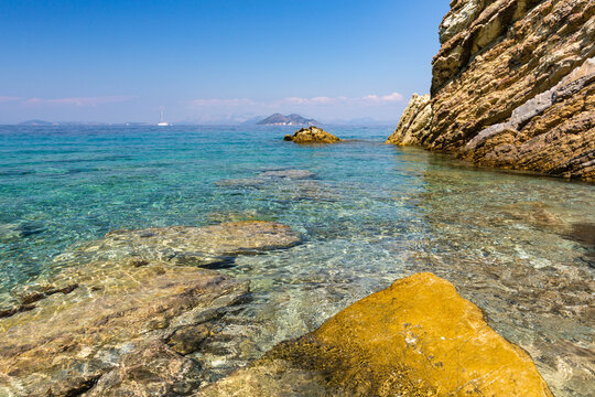 Rocky coastline and Beach with clear turquoise water, Ithaki, Greece