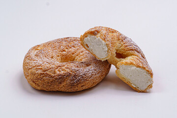 Bakery custard with cream on a white background