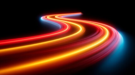 Abstract light trail with a dark background. The colorful trail has a wavy shape and suggests speed and motion