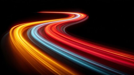 Dynamic light trails captured against a dark background, evoking a sense of speed and movement. The vibrant streaks of color create a visually captivating display