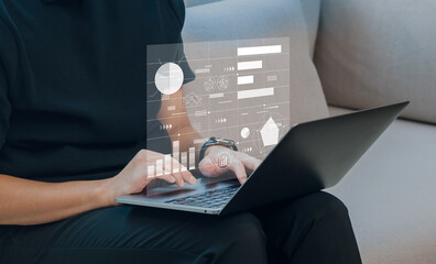 ノートパソコンでデータ解析を行うビジネスマン　マーケティング戦略立案や企業の成長に向けた統計データの分析イメージ　