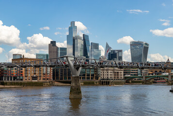 Obraz premium Millennium Bridge and City of London District Financial Center