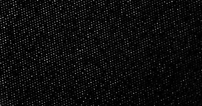 Dark halftone printed dot pattern in stop-motion style. High-contrast monochrome texture ideal for editorial layouts, grunge design, print themes, overlays, and abstract backdrops.