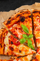 Pizza tomato margarita fast food natural product tasty snack fresh delicious gourmet food background on the table rustic top view copy space