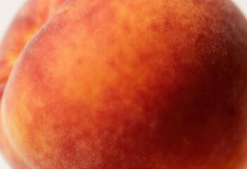 Close-up of ripe peach with natural texture