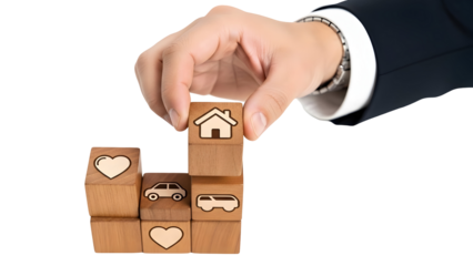 Hand placing wooden block with house icon isolated on transparent background