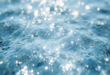 Obraz premium Sparkling Water Droplets on Shallow Blue Surface