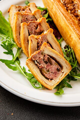 pate en crout in pastry natural baking healthy food main course ingredient appetizer fresh tasty table setting gourmet food background on the table rustic food top view copy space