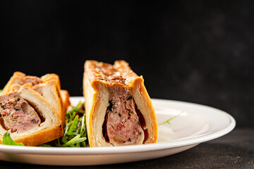 pate en crout in pastry natural baking healthy food main course ingredient appetizer fresh tasty table setting gourmet food background on the table rustic food top view copy space