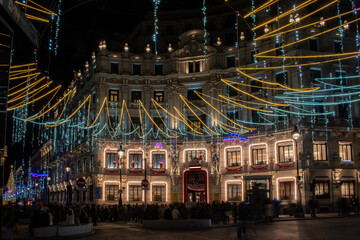 Christmas decorations with colored lights in Canalejas Square in Madrid, Spain.