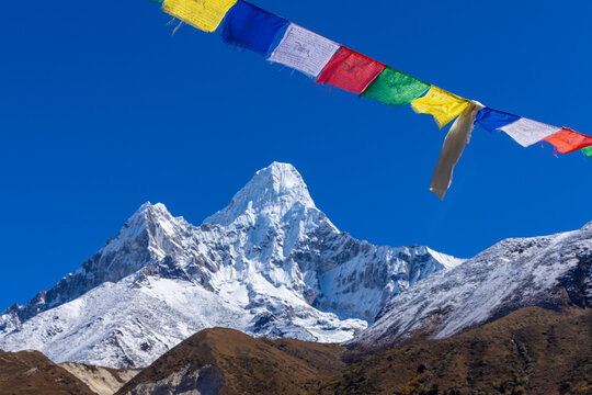 Ama Dablam mountain summit, famous mountain view in Himalaya mountains, Nepal. Everest Base Camp trek beautiful landscape view of snow high altitude summit and glacier. AmaDablam classic view