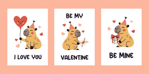 Fototapeta premium Vector set of cute valentine capybara greeting cards with heart balloon and i love you quote, love letter with be my valentine text, and gift box with be mine message. Poster design.